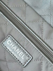 CHANEL 26S 22 BAG 42 IN METALLIC SILVER QUILTED SHINY CALFSKIN