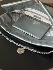 CHANEL 26S 22 BAG 42 IN METALLIC SILVER QUILTED SHINY CALFSKIN