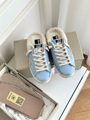 SUPER-STAR SABOTS IN BLUE CALFSKIN WITH GLITTER WHITE STAR
