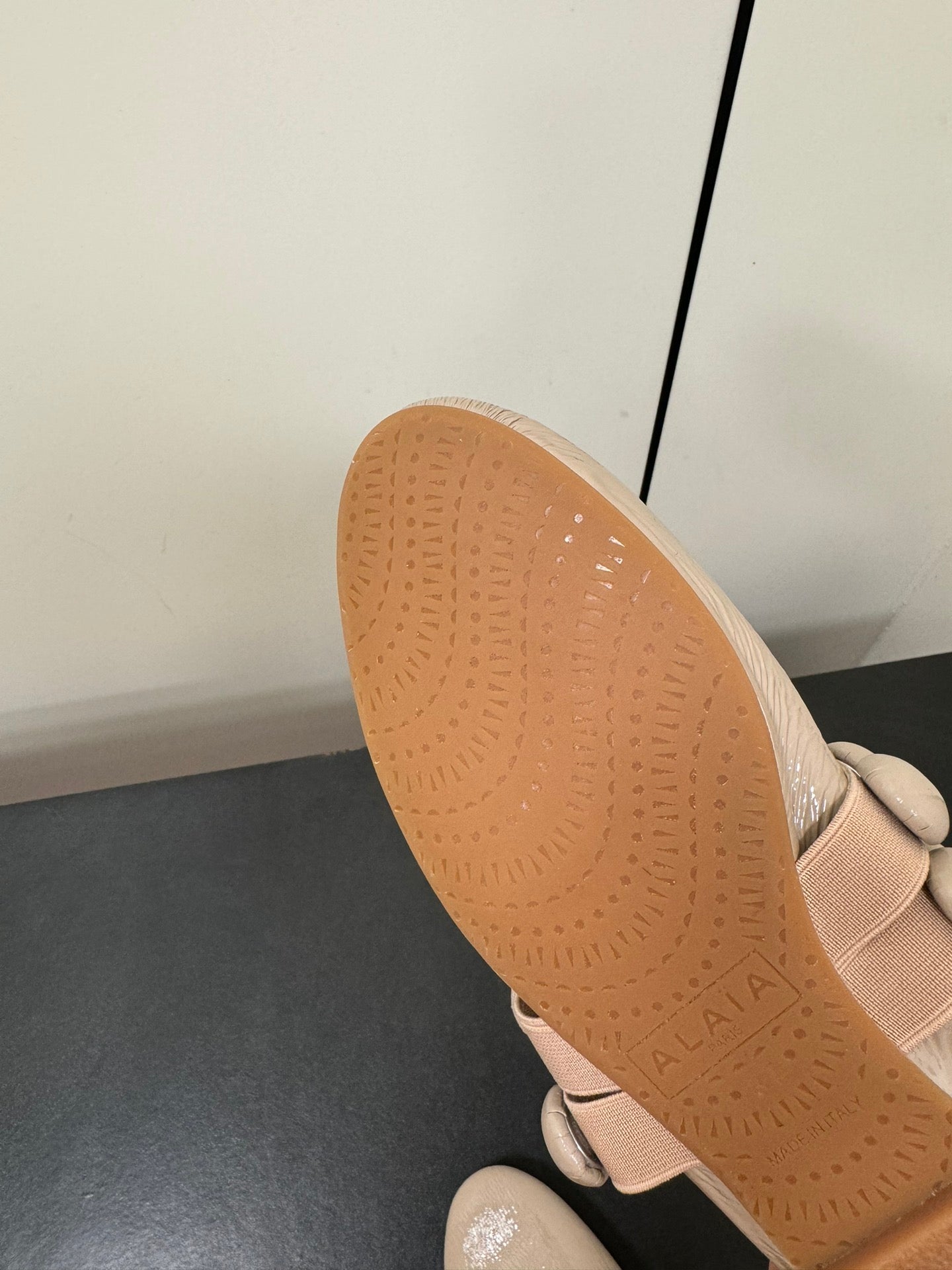 ALAIA SPHERE BALLET FLATS IN ALMOND BEIGE LAMBSKIN