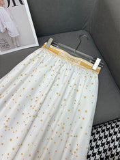 WHITE FLARED SKIRT WITH PRINT