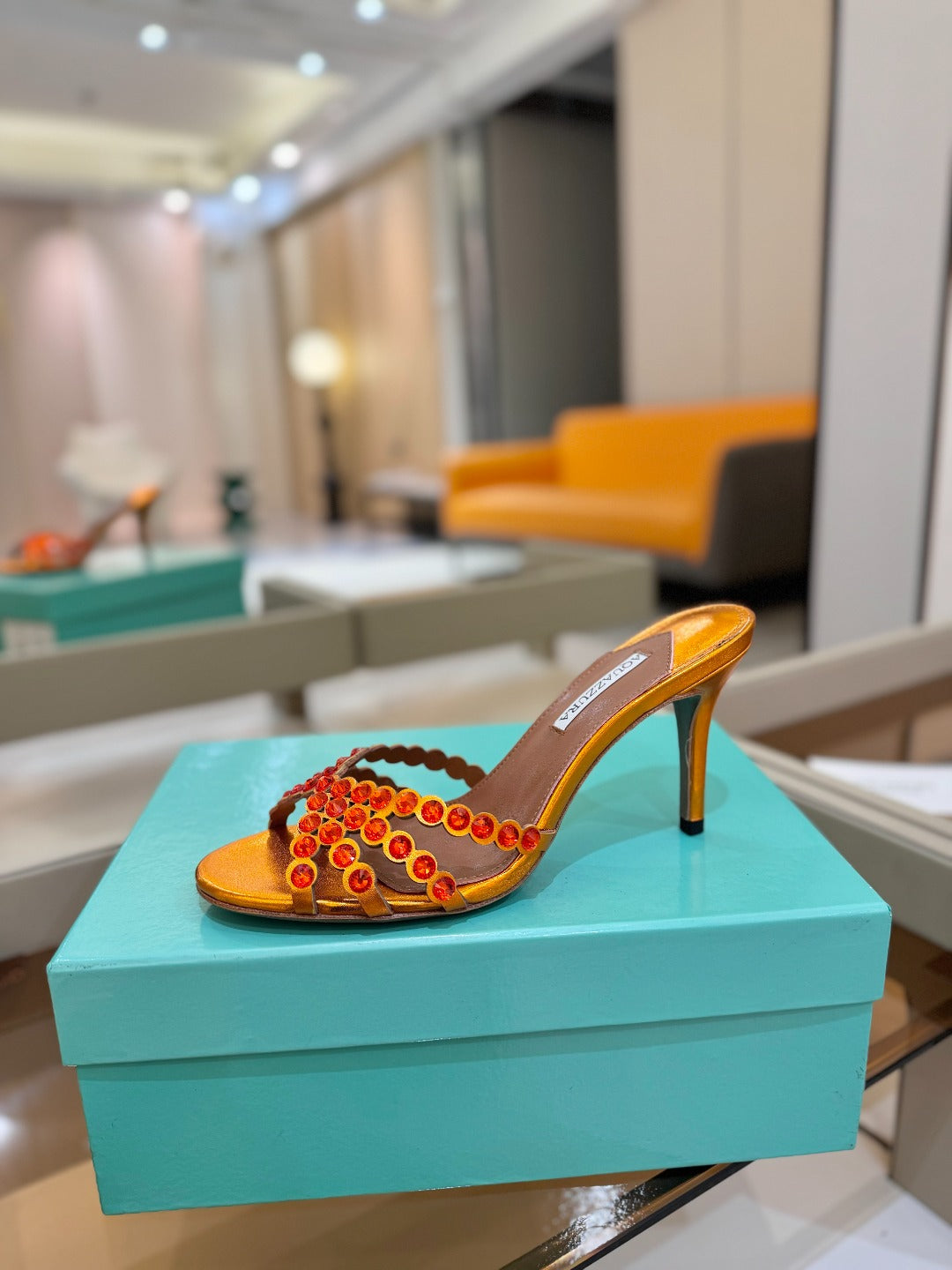 AQUAZZURA 26S TEQUILA HEELED SANDALS 85 MM IN METALLIC ORANGE LAMBSKIN