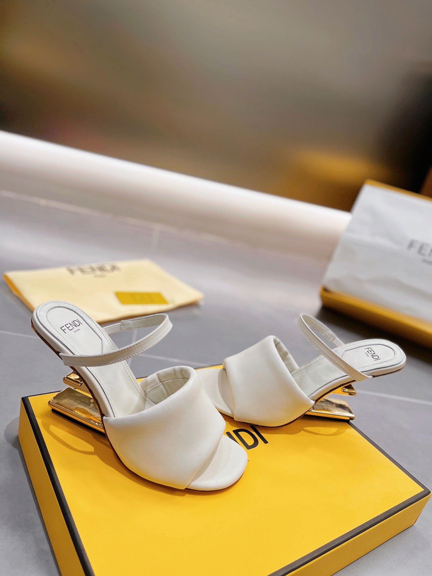 FENDI BAGUETTE HIGH-HEEL SANDALS 8 CM IN WHITE CALFSKIN