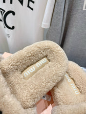 MIUMIU 26S SANDALS IN BEIGE SHEARLING WITH LOGO LETTERING